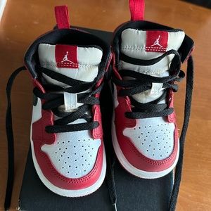 Jordan 1 Mid toddler sneakers size 6C red black and white color way.
